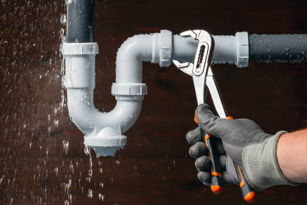 Professional Drain Cleaning technician working in Fiskdale, MA